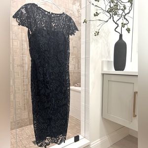 patra long length navy blue lace dress with an attached navy blue slip dress